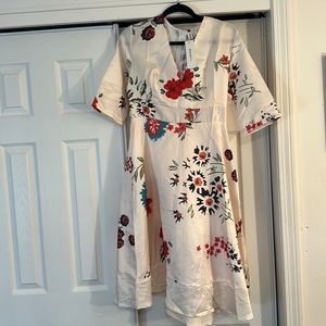Brand new lovely floral print satin dress. Zipper in back. Size XL runs small.